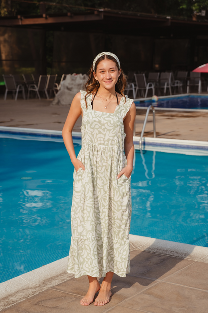 Vestido Verdino en una pieza ,

elaborado en algodón 100% tipo hindú 

Espalda cruzada 