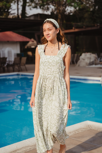 Vestido Verdino en una pieza ,

elaborado en algodón 100% tipo hindú 

Espalda cruzada 